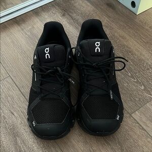 On Running Black Athletic Shoes with Cloud Cushioning